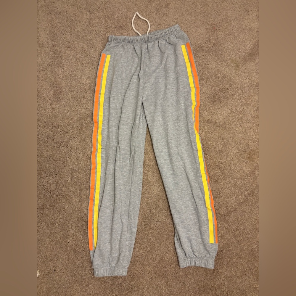 Gray sweatpants with Orange, Yellow, Purple, and blue Stripes